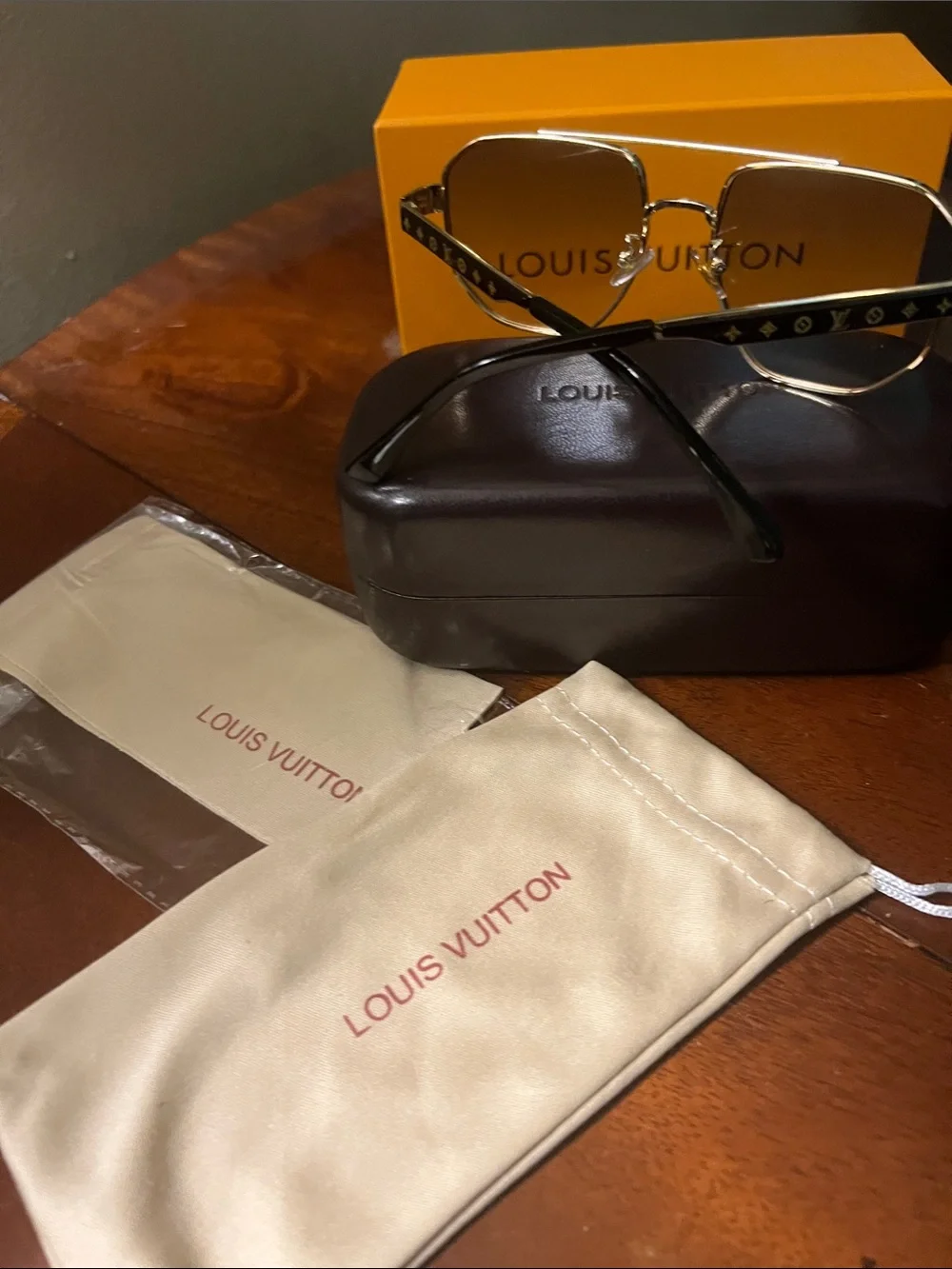 Designer Men’s Gold Frame Sunglasses with Black Lenses and Brown Case